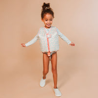 swim-essentials-flowers-green-swim-vest-3-6-years-wholesale-4