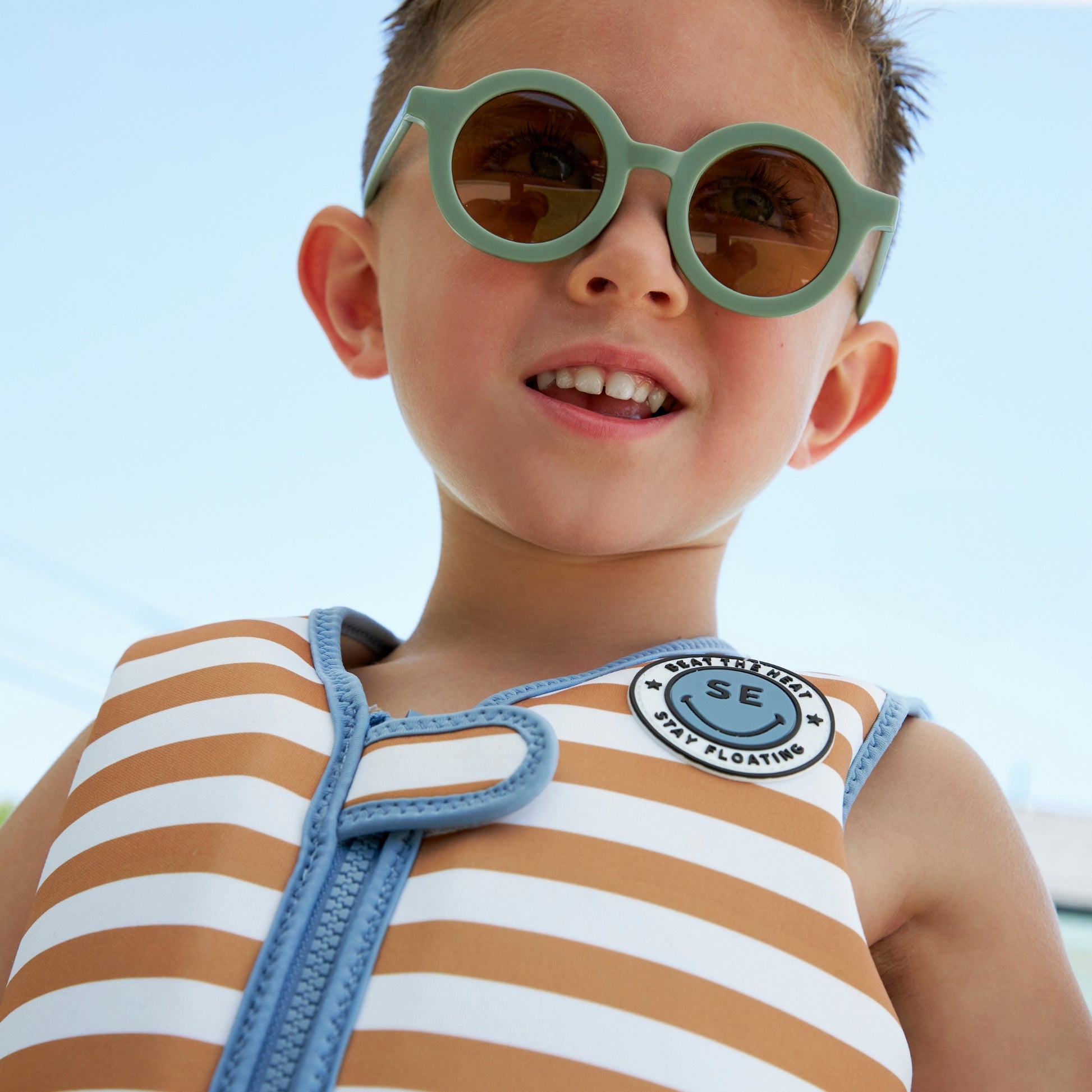 swim-essentials-brown-white-stripes-3-6-years-swim-vest-wholesale-5